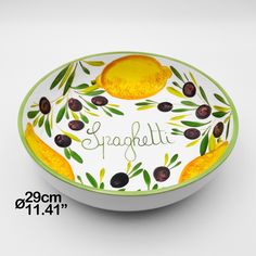 a bowl with olives and lemons painted on it