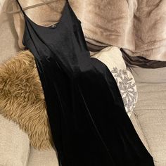 Does Not Have The Tags But This Has Never Been Worn Out! This Is A Very Nice Black Velvet Cami Slip Dress That Would Be Perfect For This Holiday Season! It Has Slits On Both Sides Of The Dress. I'm A Size 10/12 And This Fit Perfectly. When Measuring The Dress From The Shoulder Strap To The End Of The Skirt, It Came In At Around 49 Inches Long. This Is A Size Large. According To Their Website, Here Are The Measurements For Their Size L: - Bust: 35"-36" - Waist: 28"-29 - Hip: 38"-39" Cami Slip Dress, Velvet Cami, To The End, For All Mankind, 7 For All Mankind, Dress Brands, Black Velvet, The End, The Dress