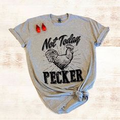 Wearing This Shirt May Help Repel Some Unwanted Drama. This Shirt Says It All, Not Today Pecker! You Are Sure To Get Some Funny Reactions Out Of People. Soft, Comfortable, And Easy To Care For. Fabric & Care Screen Printed 90% Cotton, 10% Polyester Color: Gray Machine Wash Cold Unisex Adult - Considered Men's Sizing Ladies Usually Prefer To Size Down One Size. Funny Reactions, Inappropriate Shirts, Funny Adult Shirts, Cute Country Outfits, Chicken Shirts, Funny Shirts Women, Not Today, Tees For Women, Country Outfits