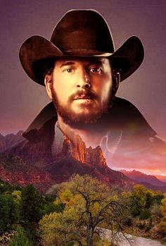 a man with a beard wearing a cowboy hat in front of mountains and trees at sunset