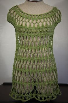 a crocheted top is shown on a mannequin