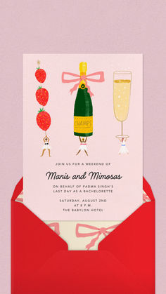 a red envelope with a champagne bottle and strawberries on it, next to a pink background