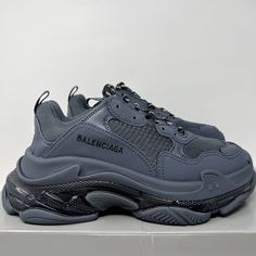 Balenciaga Triple S Women’s Sneakers  100% Original & Authentic Guaranteed  Size: 39 EU / 9 US Color: Dark Blue Balenciaga Style Code: 544351 W2GA1 4900 Brand New In Box With Dust Bag & Spare Laces Named for their three-sole construction, these Triple S sneakers flaunt tonal detailing in lightweight textile and mesh. The toe is embroidered with the shoe’s size, and the chunky sole offers support. Round toe Lace-up vamp Lining: Fabric Rubber sole All our items are 100% Authentic Guaranteed  Item Blue Balenciaga Shoes, Balenciaga Style, Balenciaga Sneakers, Balenciaga Women, Balenciaga Shoes, Balenciaga Triple S, Chunky Sneakers, Blue Bags, Air Max Sneakers