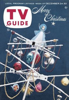 a christmas tree with ornaments on it and the words tv guide written in red above it