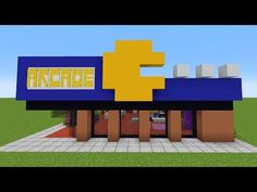 the entrance to an arcade in minecraft with a large sign on it's side