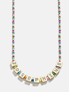 Orders placed between 12/2 - 12/15 will ship between 12/30 - 1/5.Brighten up your little one's day with our Kids’ Custom Beaded Necklace. Personalize it with their name or a special phrase for a one-of-a-kind accessory. Shimmering with glass stones, it's a fun and colorful way to add a personal touch to any outfit. Please note: intended for children 3+. Necklaces Kids, 2024 Jewelry, Dec 1st, Last Day To Order, Early Black Friday, Fall Events, Time Kids, Kids Necklace, Family Event