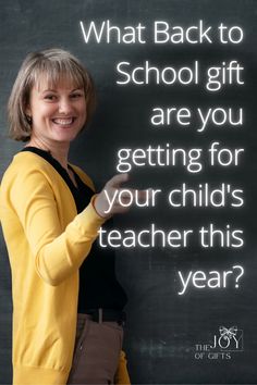 a woman standing in front of a blackboard with the words what back to school gift are you getting for your child's teacher this year?