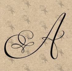 the letter a is written in cursive black ink on a brown paper background