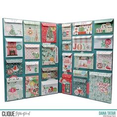 an open christmas card board with lots of different cards on the front and back side