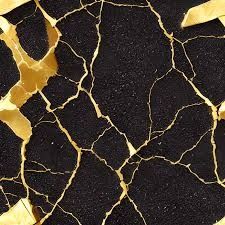 black and gold marbled surface with golden foil on the edges, including cracky lines