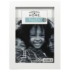 a white frame with the words complete home on it and three children smiling in front