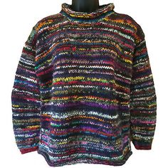 a multicolored sweater on a mannequin's dummy head, with the hood pulled up