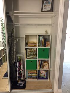 the closet is filled with books and other items for children's playrooms