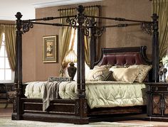 a bedroom with four poster bed, dresser and mirror