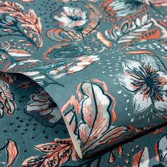 an orange and blue floral print fabric