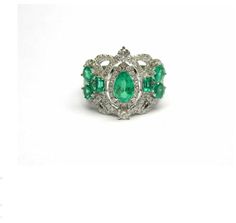 LAST CALL, LAST CHANCE LIQUIDATION SALE The Following Item we are offering is a Rare Important Radiant 18KT Gold Large Fancy Colombian Emerald and Diamond Ring.  Ring is comprised of Gorgeous Fancy Colombian Emeralds surrounded with Beautiful Glittering Fancy Diamonds. T.C.W APPROX 3CTS This Magnificent Ring is a Rare Sample Piece from a Private Manufacturer that sells to Important 5 Star Hotel and Fine Jewelry Stores and comes Brand New With Tags $14,500!! WE PACK, SHIP, AND INSURE WORLDWIDE COME VISIT US AT:   ROYALE GALLERIES INC. 318 EAST 59TH STREET NEW YORK, NY 10022 212-308-0200 LOCATED IN THE HEART OF SUTTON PLACE AND DECORATORS ROW, NYC Sutton Place, Emerald And Diamond Ring, Liquidation Sale, Emerald Diamond Ring, Colombian Emeralds, Fancy Diamonds, Star Hotel, Emerald Diamond, Ring Ring