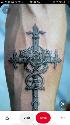 an image of a cross tattoo on someone's leg with the caption saying, visit save