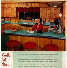 an advertisement for kitchen furniture with a woman sitting at the counter