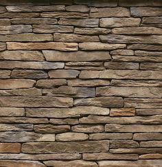 a stone wall that is made out of different types of rocks