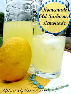 a lemon next to a glass of lemonade on a table with the words homemade old - fashioned lemonade