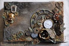 an altered clock is sitting on top of a piece of paper that has gears and other things attached to it