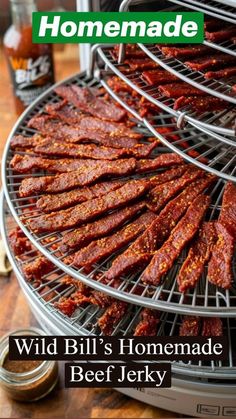 there is a large grill with ribs on it and the words wild bill's homemade beef