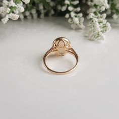 RING DETAILS:✪Design: Gold ring✪Gemstone: Natural welo opal, moissanite diamonds✪Gemstone shape: Oval✪Gemstone size: 10X12 mm✪Setting type: Prong✪Metal type: 14k solid yellow gold✪Metal finish: Smooth shinyChoose your ring size from drop down menu and if you need any other preferred ring size please contact us.**********************************QUALITY OF MATERIALS:Metal: Most of our jewelry at JewelryMansion is made with precious metals like gold and silver. These metals are 100% non-allergic to Anniversary Opal Ring Stamped 14k In Oval Shape, Heirloom Style Gold Opal Ring With Bezel Setting, Oval Opal Ring Stamped 14k For Anniversary, Heirloom Gold Opal Ring With Bezel Setting, Gold Opal Birthstone Ring For Anniversary, Gold Moonstone Ring With Bezel Setting For Wedding, Gold Rings With Accent Stones For Proposal, Gold Proposal Rings With Accent Stones, Gold Opal Ring With Bezel Setting