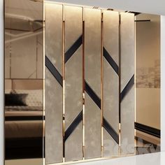 a room divider made out of metal and glass with an abstract design on it