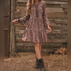 New Boho Floral Mini Smock Dress * Long Wrist Length Ruffle Sleeve * Round Neck * Tiered Short Skirt * Ruffle Hem *Approximate Unstretched Measurements* Small (4) * Bust 37.25" * Waist 37.75" * Sleeve Length 21.25" * Length 35.25" Medium (6) * Bust 39" * Waist 39.25" * Sleeve Length 21.5" * Length 36.25" Large (8/10) * Bust 41.25" * Waist 41.5" * Sleeve Length 22.25" * Length 37" Xl (12) * Bust 43.5" * Waist 44" * Sleeve Length 11.75" * Length 37.75" On Order * Will Ship In Approx 7-10 Days Fabr Beige Floral Dress Fall, Brown Pattern Fall Dress, Fall Dress With Boots Roolee, Affordable Floral Print Fall Dresses, Basic Fall Dresses, Floral Long Sleeve Dress Fall, Long Sleeve Ditsy Floral Dress, Trendy Fall Casual Dresses, Every Day Dresses Casual Winter