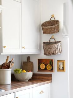 the kitchen counter is clean and ready to be used as a storage area for cooking utensils