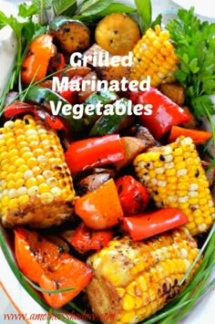 grilled marinated veggies in a white bowl with green garnish