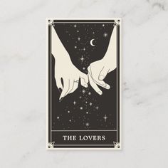 the lovers tarot card with two hands reaching for each other's hand, and stars in the background