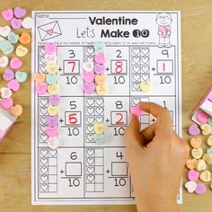 valentine's day math activity for kids to practice counting with marshmallows