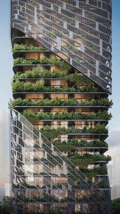 a tall building with many plants growing on it's sides and stairs leading up to the second floor