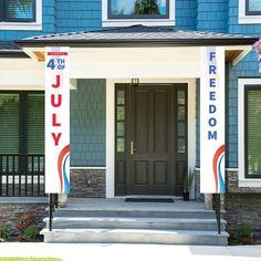 the front door of a blue house with red, white and blue banners