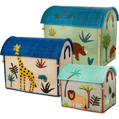 two toy houses with animals painted on them