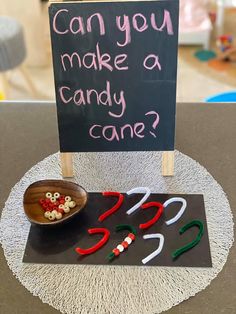 a sign that says can you make a candy cane? with some red and green peppers