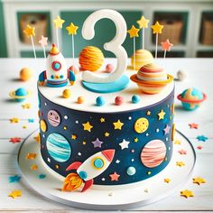 a space themed birthday cake with the number three on it's top and stars around it