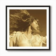 a woman with her hair blowing in the wind, sepia photograph framed in black and white