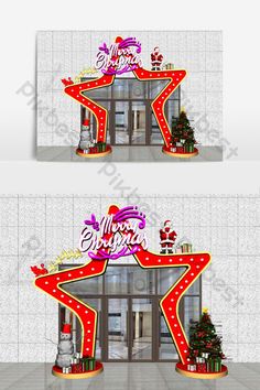 two christmas signs in front of a building with presents on the top and below them