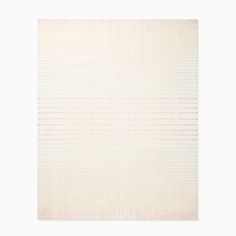 a white rug with lines and dots on the bottom, in front of a white background