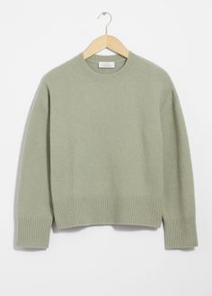 Long-sleeve knit sweater with a relaxed silhouette. Finished with a ribbed neckline, cuffs and hemlineLength of sweater: 53cm / 20.9" (Size S) Khaki Sweater, Summer Style Guide, Waistcoat Dress, Knit Outerwear, Linen Sweater, Long Sleeve Knit Sweaters, Half Zip Sweaters, Ribbed Neckline, Fashion Story