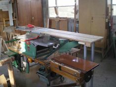 a workbench in a workshop with lots of woodworking tools on the table