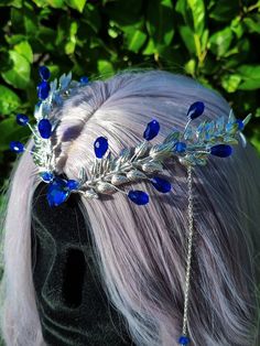 Dive into the ethereal world of the Water Priestess Tiara! This enchanting headpiece features a silver tiara base adorned with captivating blue round and teardrop beads. Delicate chains dangle gracefully, each adorned with additional beads, creating a mesmerizing cascade. At the heart of it all, a sparkling blue rhinestone takes center stage. Embrace the magic of the water element and make a statement with this elegant tiara, perfect for mystical ceremonies or fantasy-inspired events This tiara is perfect for a fantasy-themed ball or a festival, DnD or fairy cosplay. Embrace your inner fantasy enthusiast at magical festivals like Renaissance fairs, where you can embody the spirit of elven elegance. It also lends itself beautifully to elven-inspired weddings, adding a touch of enchantment t Water Priestess, Elf Headpiece, Elegant Tiara, Tiara Blue, Blue Tiara, Elven Tiara, Fantasy Accessories, Fantasy Ball, Fairy Cosplay