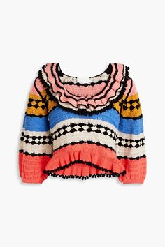 a colorful sweater with ruffles on the shoulders