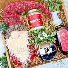 a christmas gift box with santa claus and other items