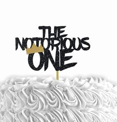 there is a cake that has the words the righteous one on it and a gold crown on top