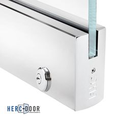 an image of a stainless steel door handle with glass inserts on the outside side