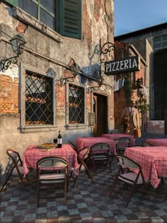 an outdoor dining area with tables and chairs