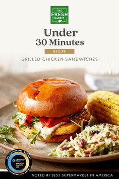 a sandwich and corn on the cob are featured in this ad for fresh market's 30 minutes grilled chicken sandwiches